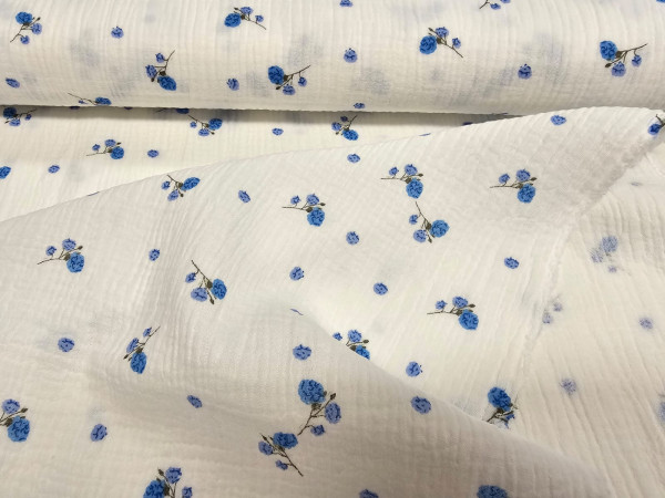 TETRA tkanina, dvoslojna- drobne modre rožice na beli osnovi