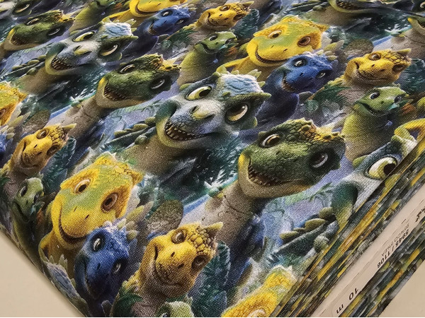 Bombažni prevešanka- dinozavri v zelenih odtenkih