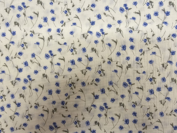TETRA tkanina, dvoslojna- drobne modre rožice na beli osnovi
